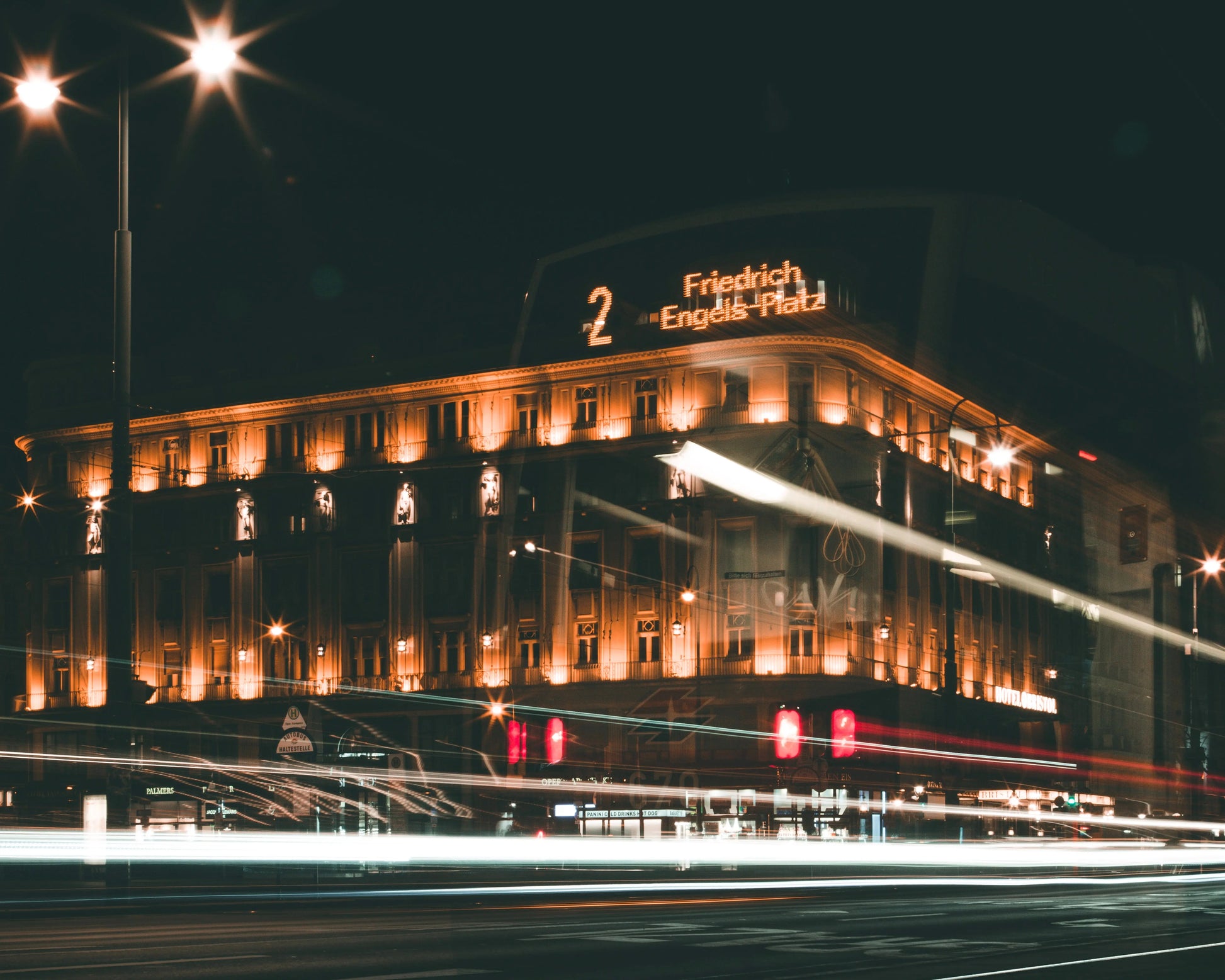 Long exposure shot of a bus stop in Vienna with Stunning lights in the city center.